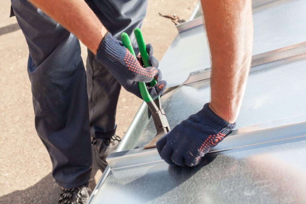 man installing gutter guard